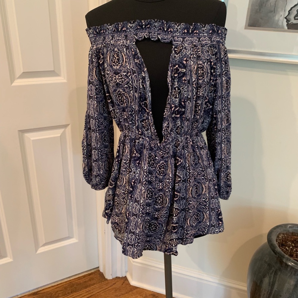 LF deep plunge romper brand new!